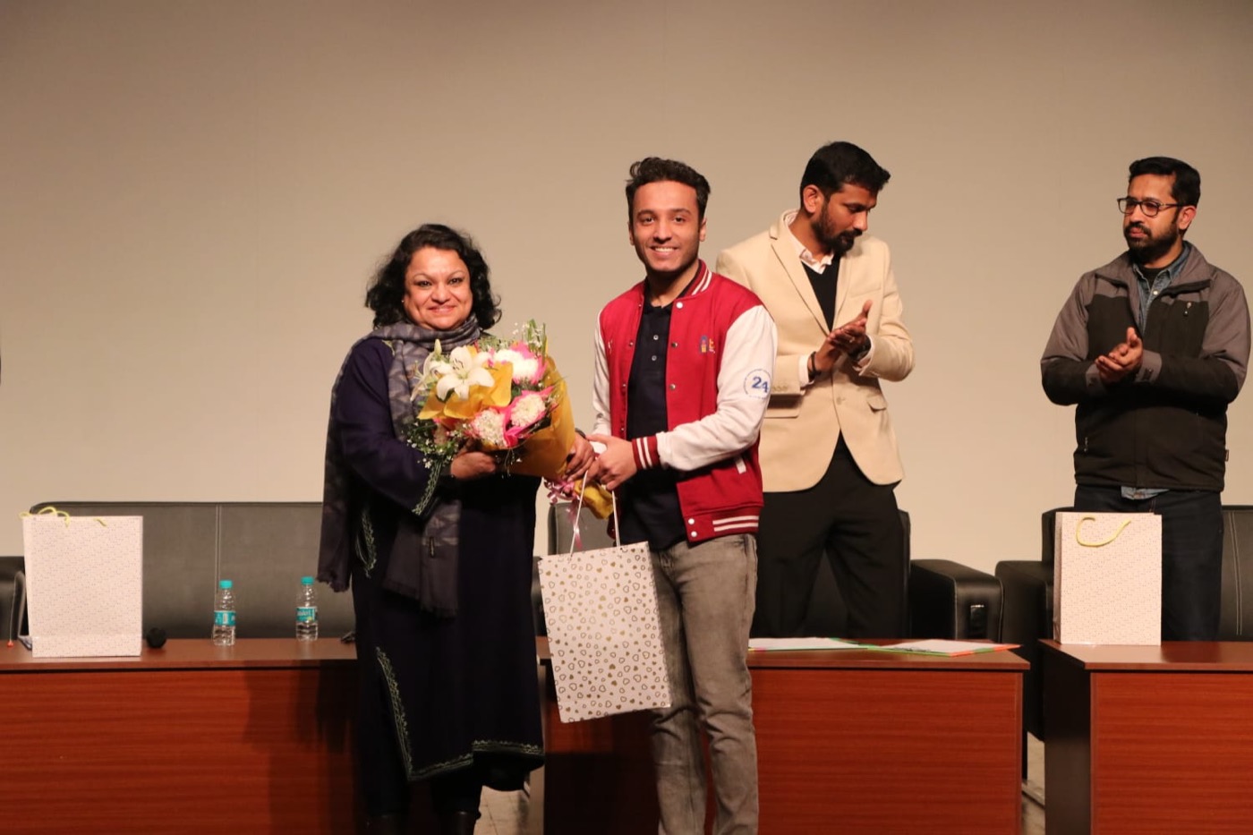 Felicitating a guest at a Limelight event